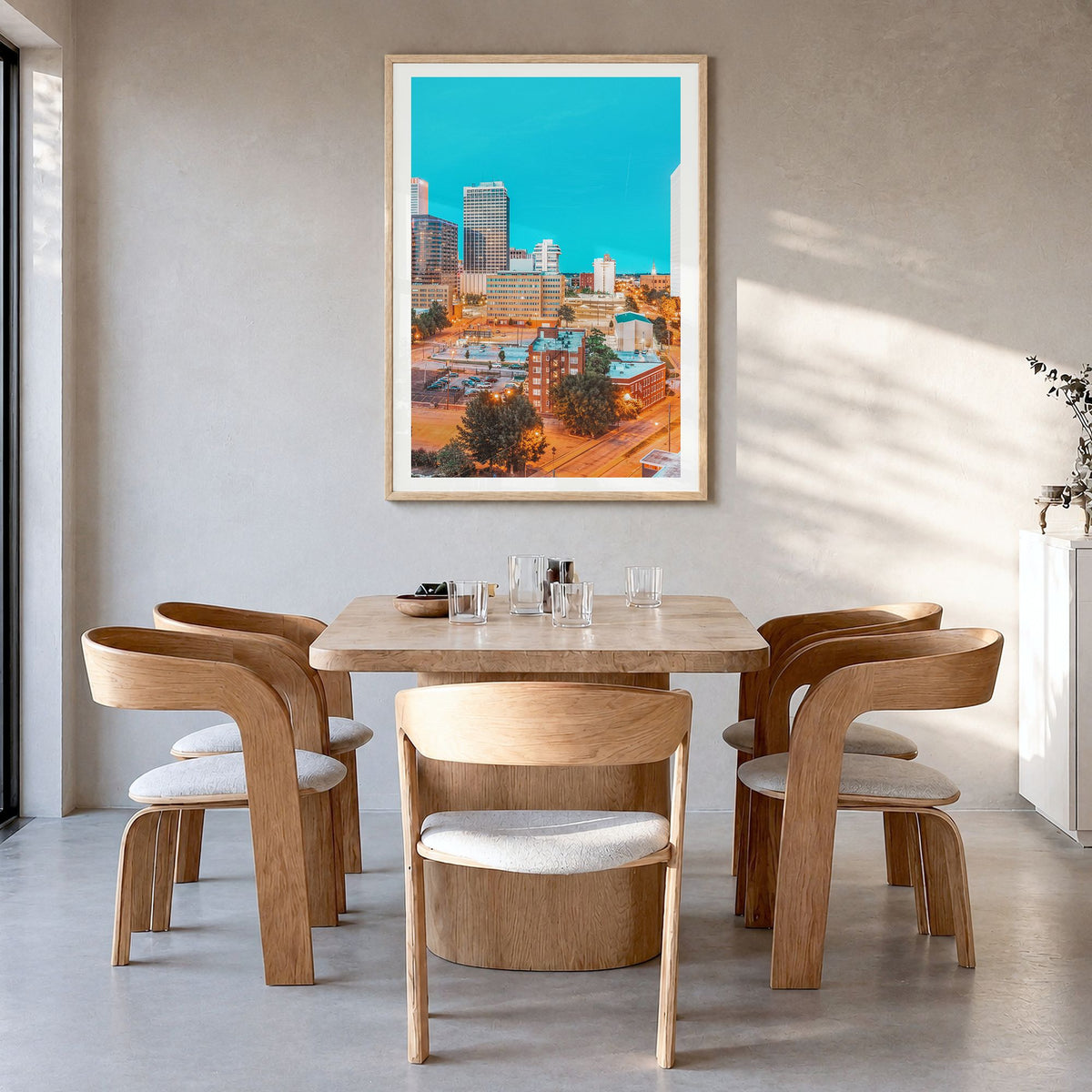 Tulsa Photo No 1 Poster in a natural wood frame, hanging in a dining room, white border