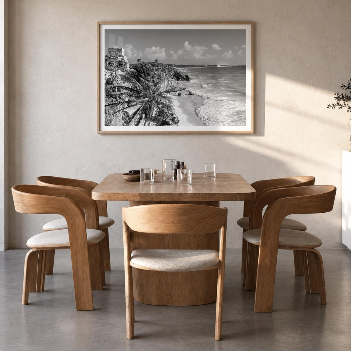 Tulum black & white photo poster of Mexico – horizontal wall art in natural wood frame with white border, hanging on wall