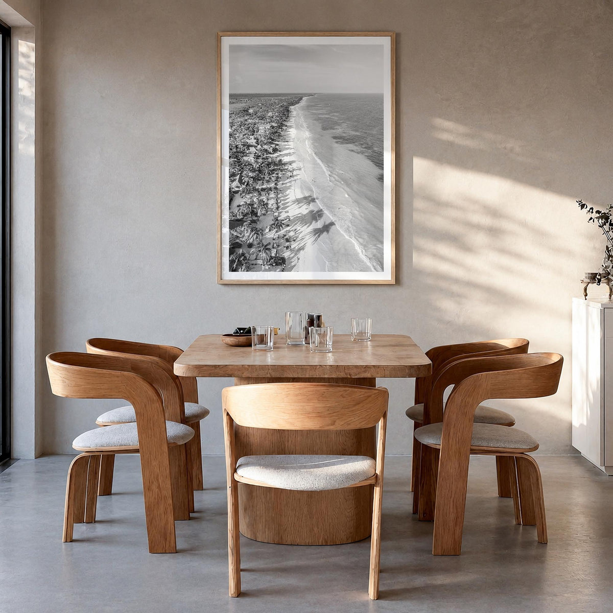 Tulum black & white photo poster of Mexico – vertical wall art in natural wood frame with white border, hanging on wall