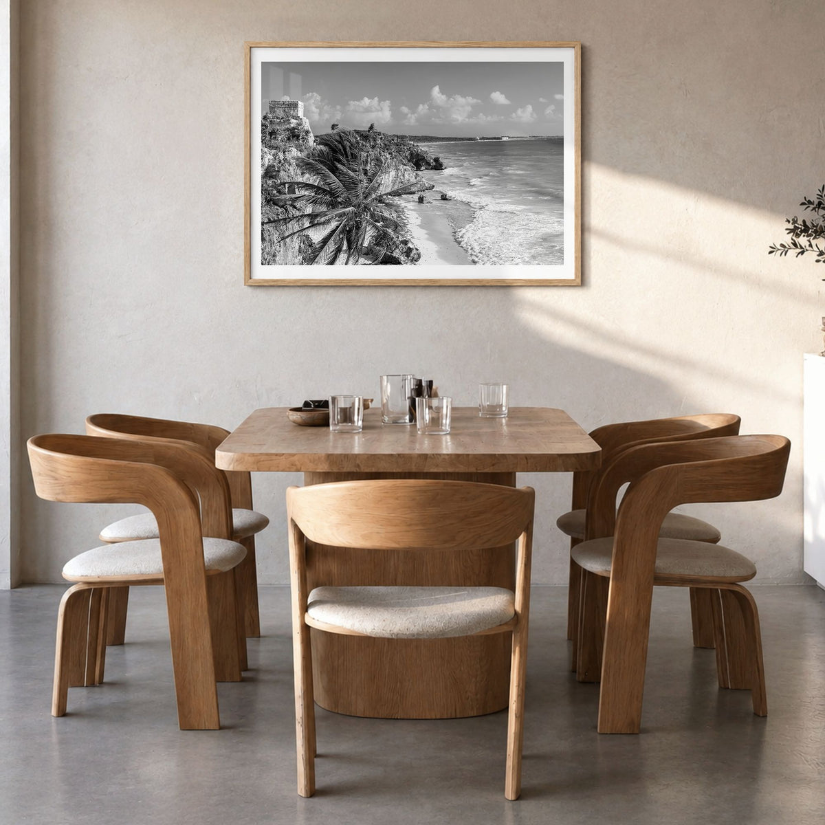 Tulum Photo Poster in a natural wood frame, hanging in a dining room, white border