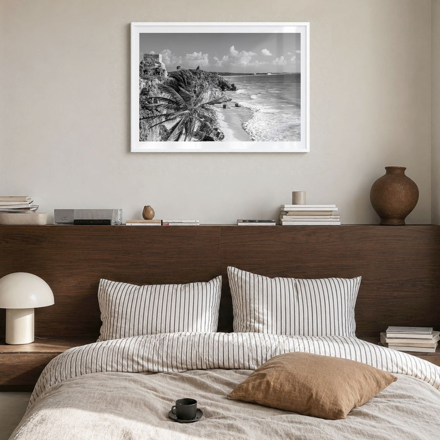 Tulum Photo Poster in a white wood frame, hanging in a bedroom, white border