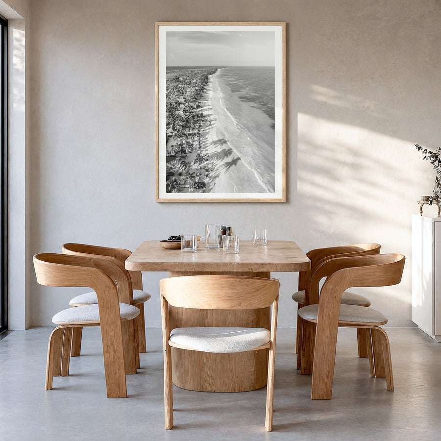 Tulum Photo Poster in a natural wood frame, hanging in a dining room, white border