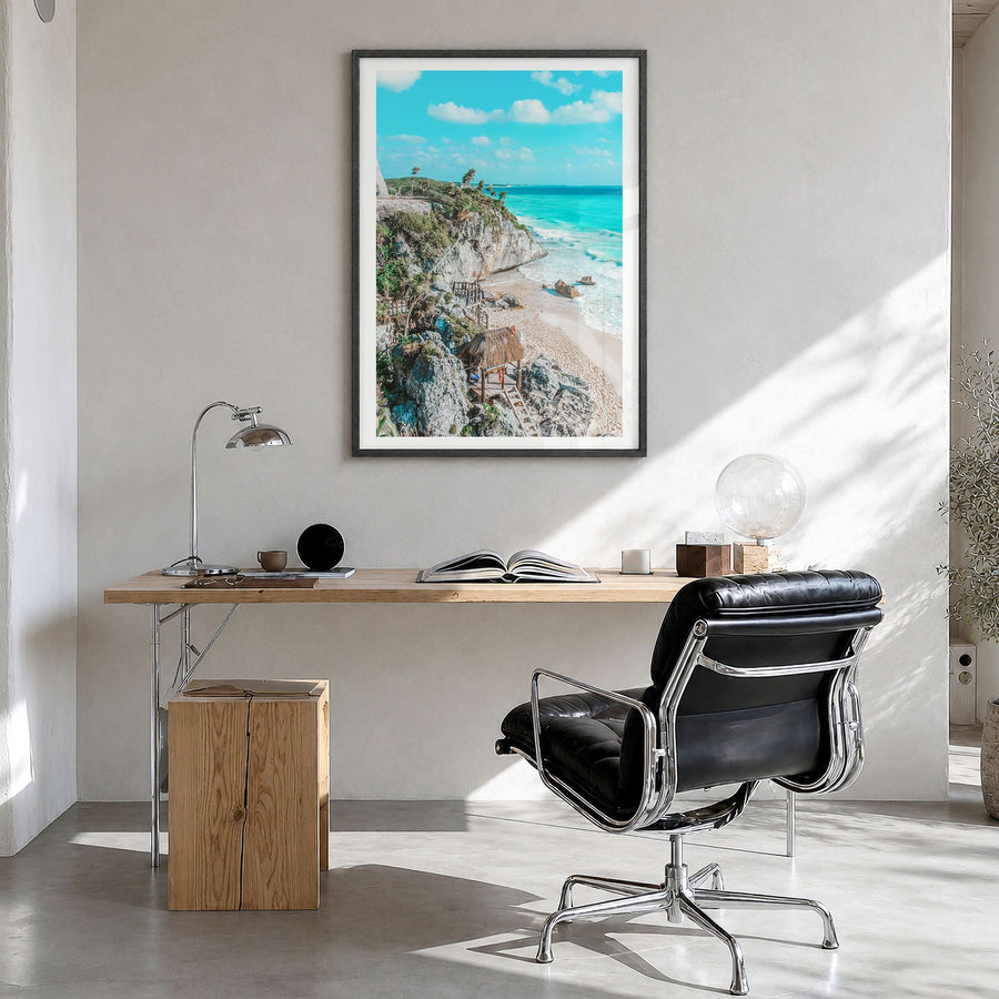Tulum Photo No 1 Poster in a black wood frame, hanging in a bright home office, white border
