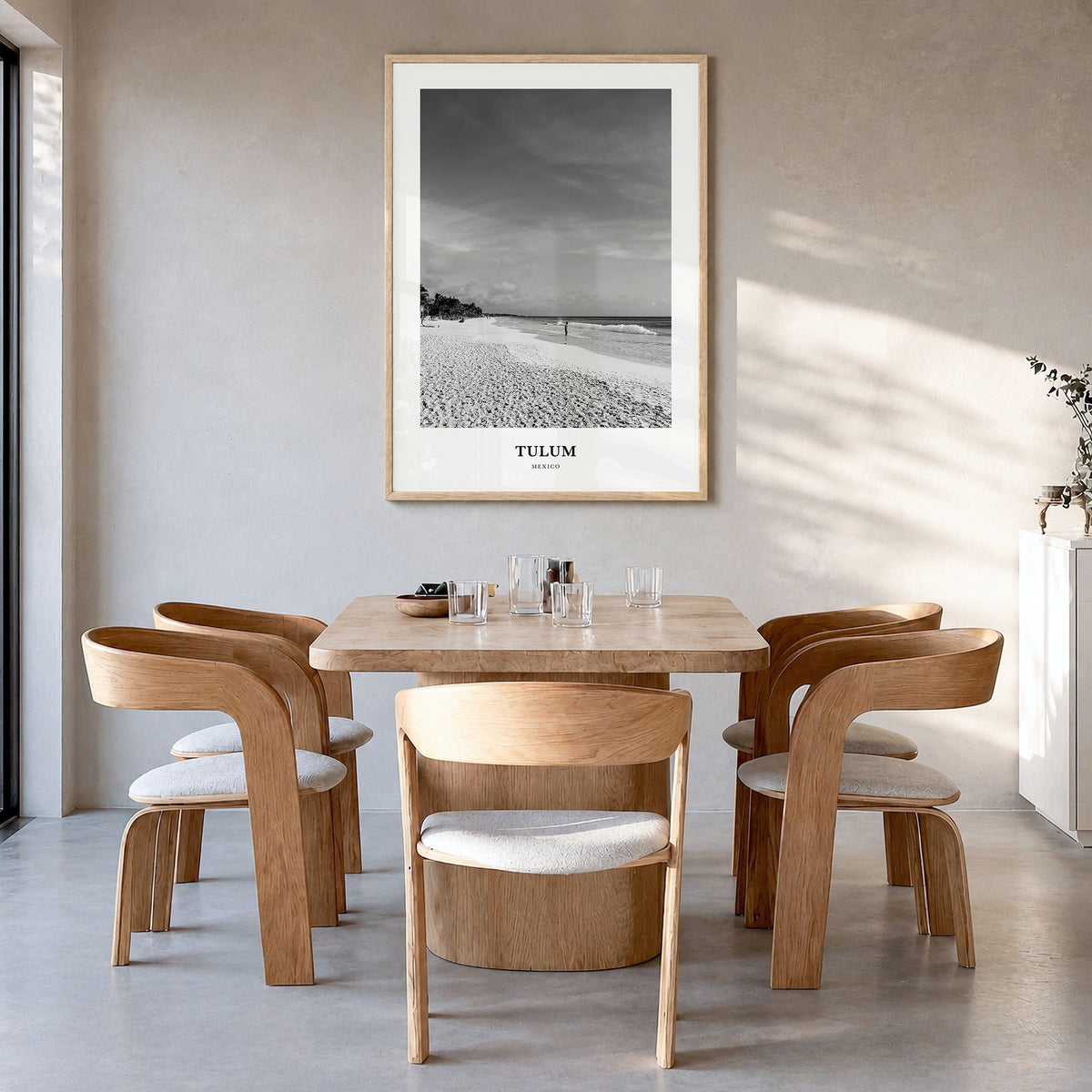 Tulum Classic No 1 Poster in a natural wood frame, hanging in a dining room