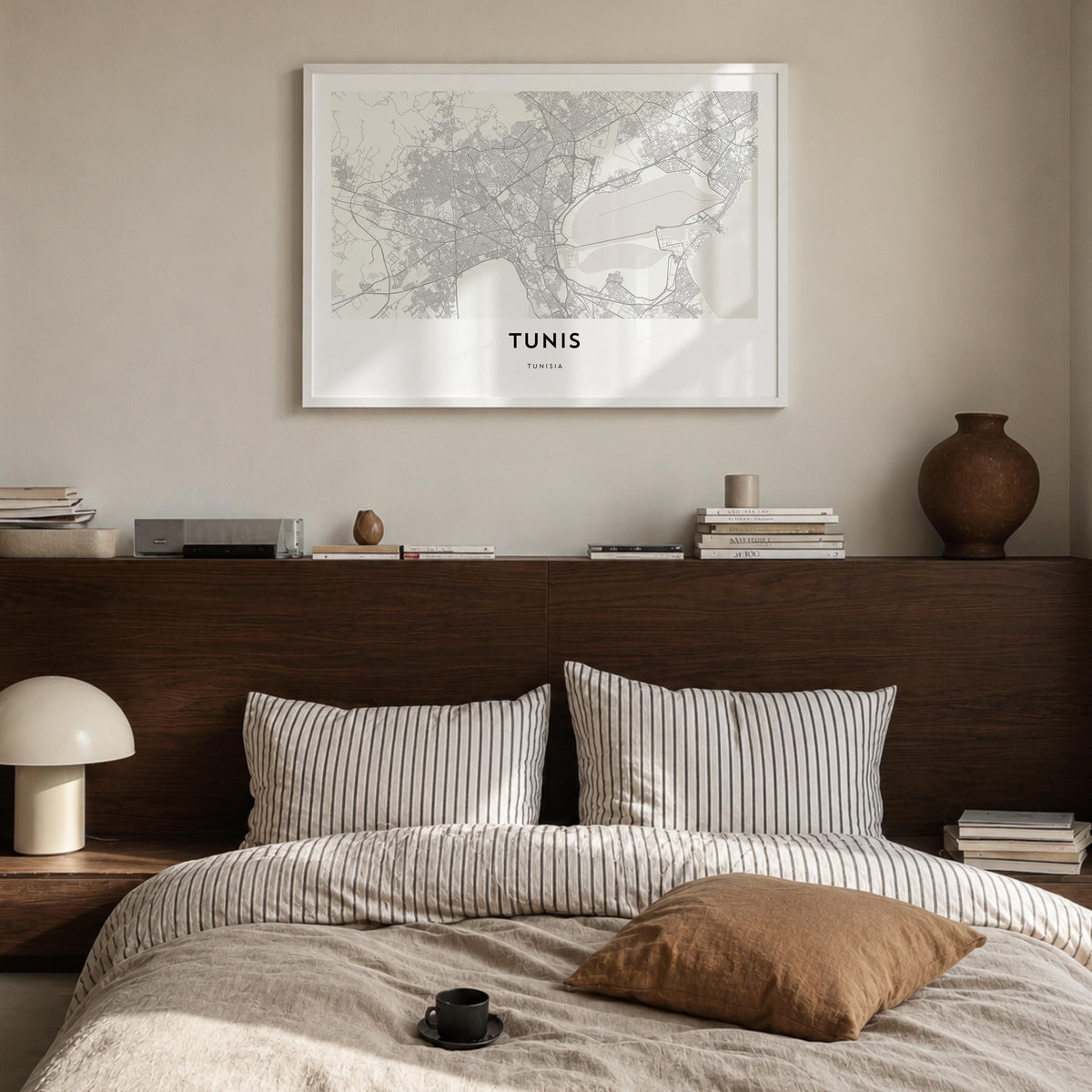 Tunis black & white map poster of Tunisia – horizontal wall art in white wood frame, hanging on wall