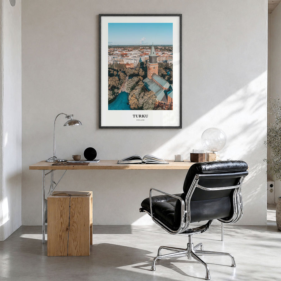 Turku Classic Poster in a black wood frame, hanging in a bright home office