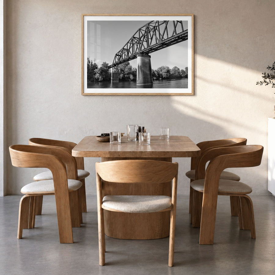 Tuscaloosa Photo Poster in a natural wood frame, hanging in a dining room, white border