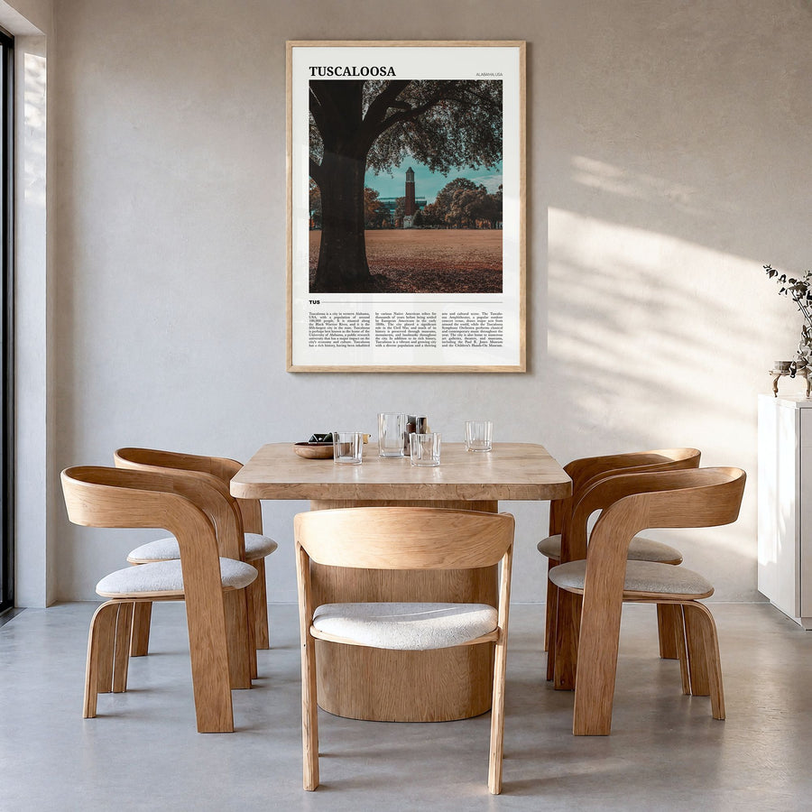 Tuscaloosa Travel Poster in a natural wood frame, hanging in a dining room