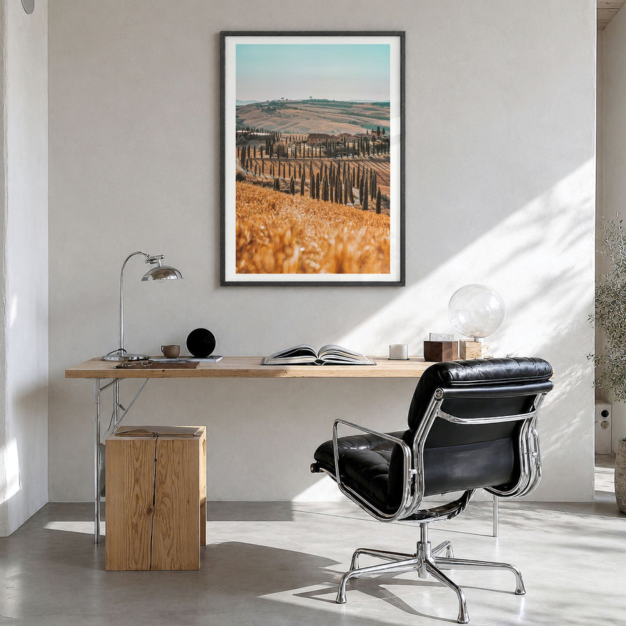 Tuscany Photo No 2 Poster in a black wood frame, hanging in a bright home office, white border