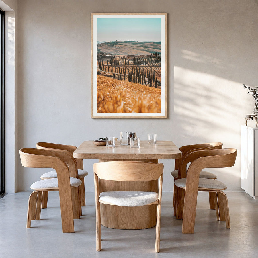 Tuscany Photo No 2 Poster in a natural wood frame, hanging in a dining room, white border