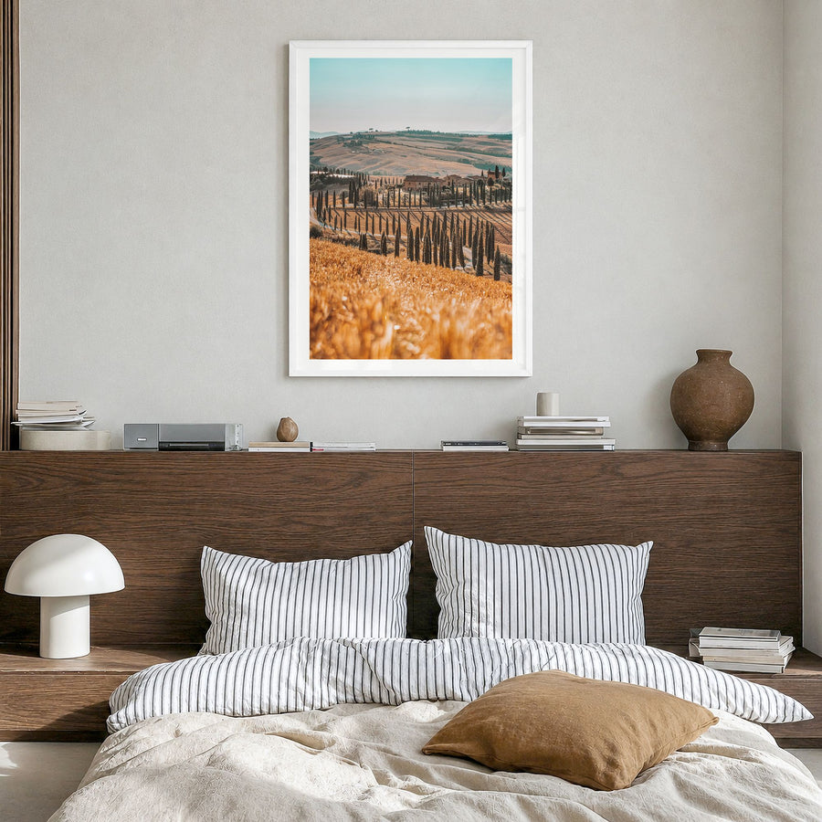 Tuscany Photo No 2 Poster in a white wood frame, hanging in a bedroom, white border