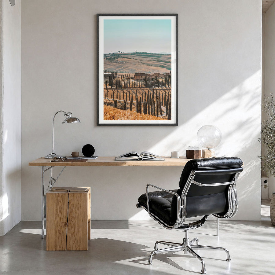 Tuscany Photo No 1 Poster in a black wood frame, hanging in a bright home office, white border
