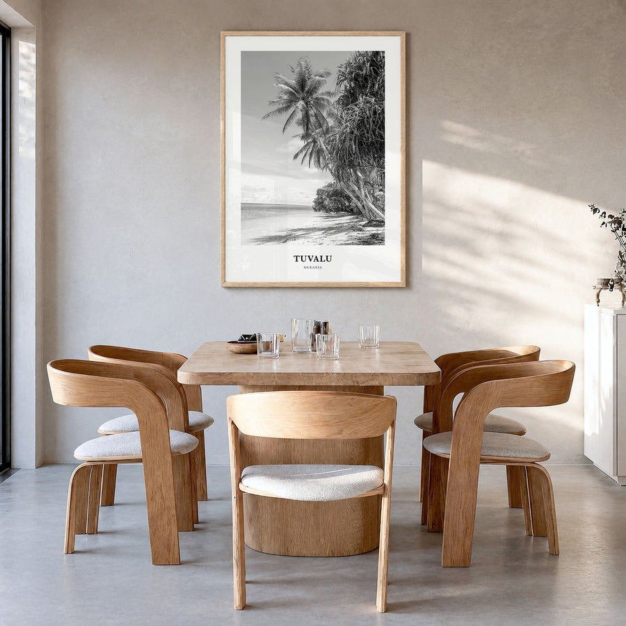 Tuvalu Classic Poster in a natural wood frame, hanging in a dining room