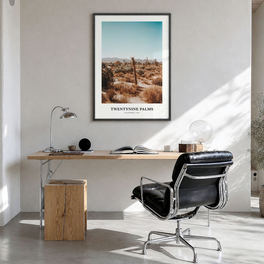 Twentynine Palms Classic Poster in a black wood frame, hanging in a bright home office