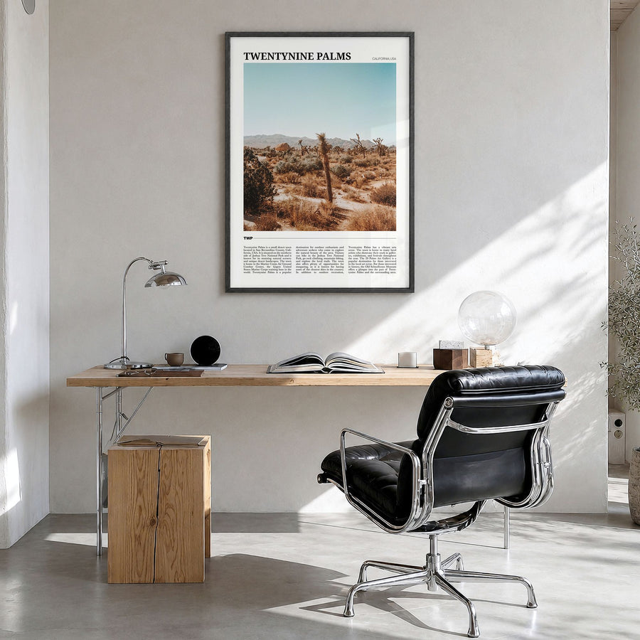 Twentynine Palms Travel Poster in a black wood frame, hanging in a bright home office