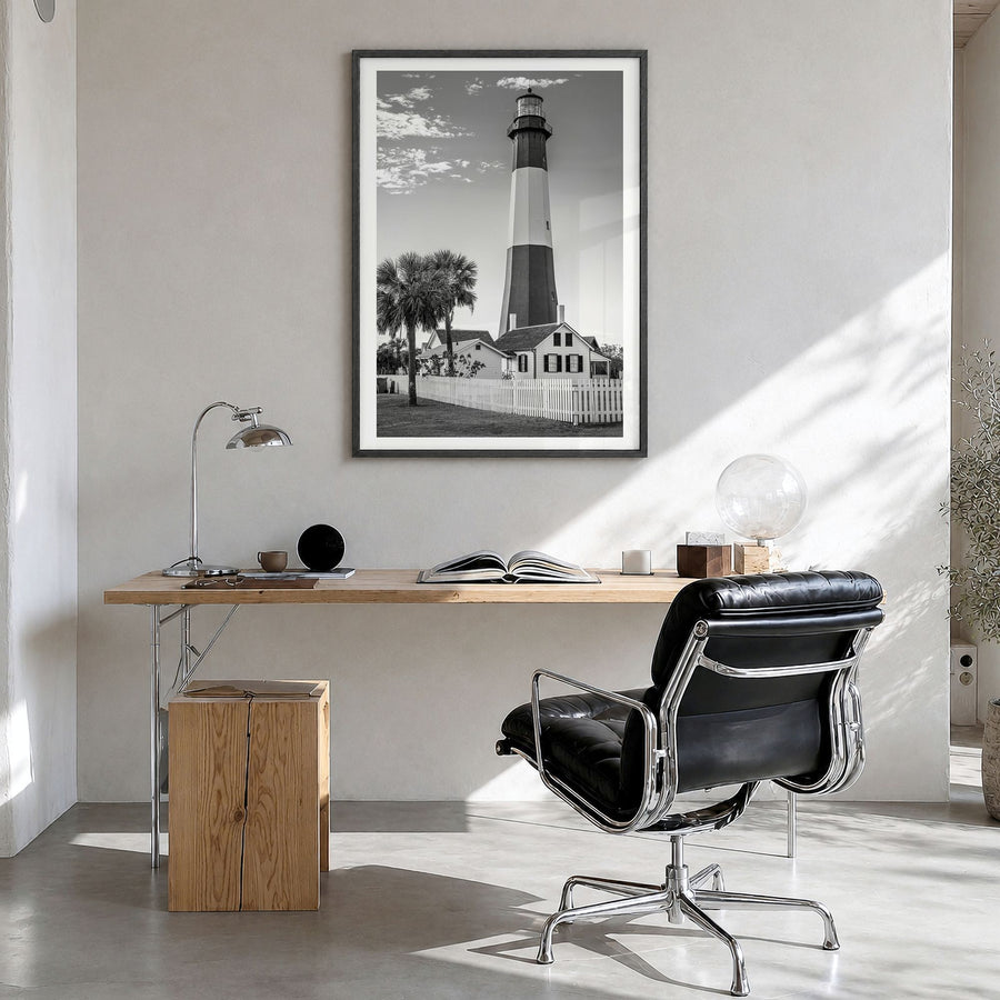 Tybee Island Photo Poster in a black wood frame, hanging in a bright home office, white border