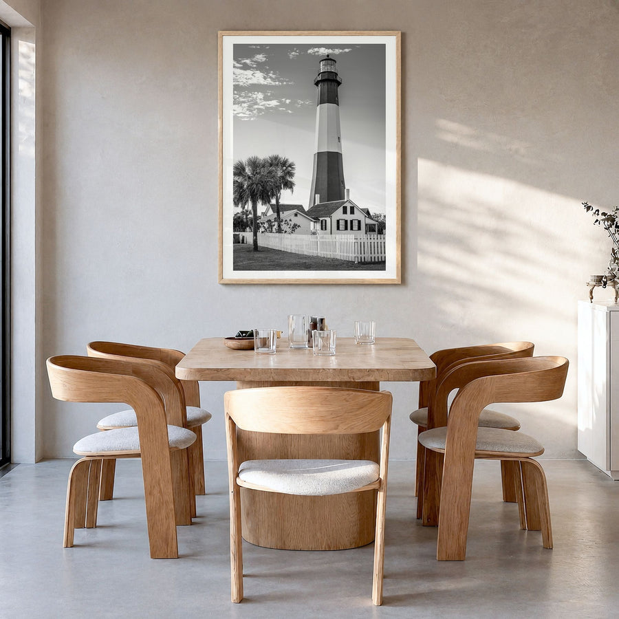 Tybee Island Photo Poster in a natural wood frame, hanging in a dining room, white border