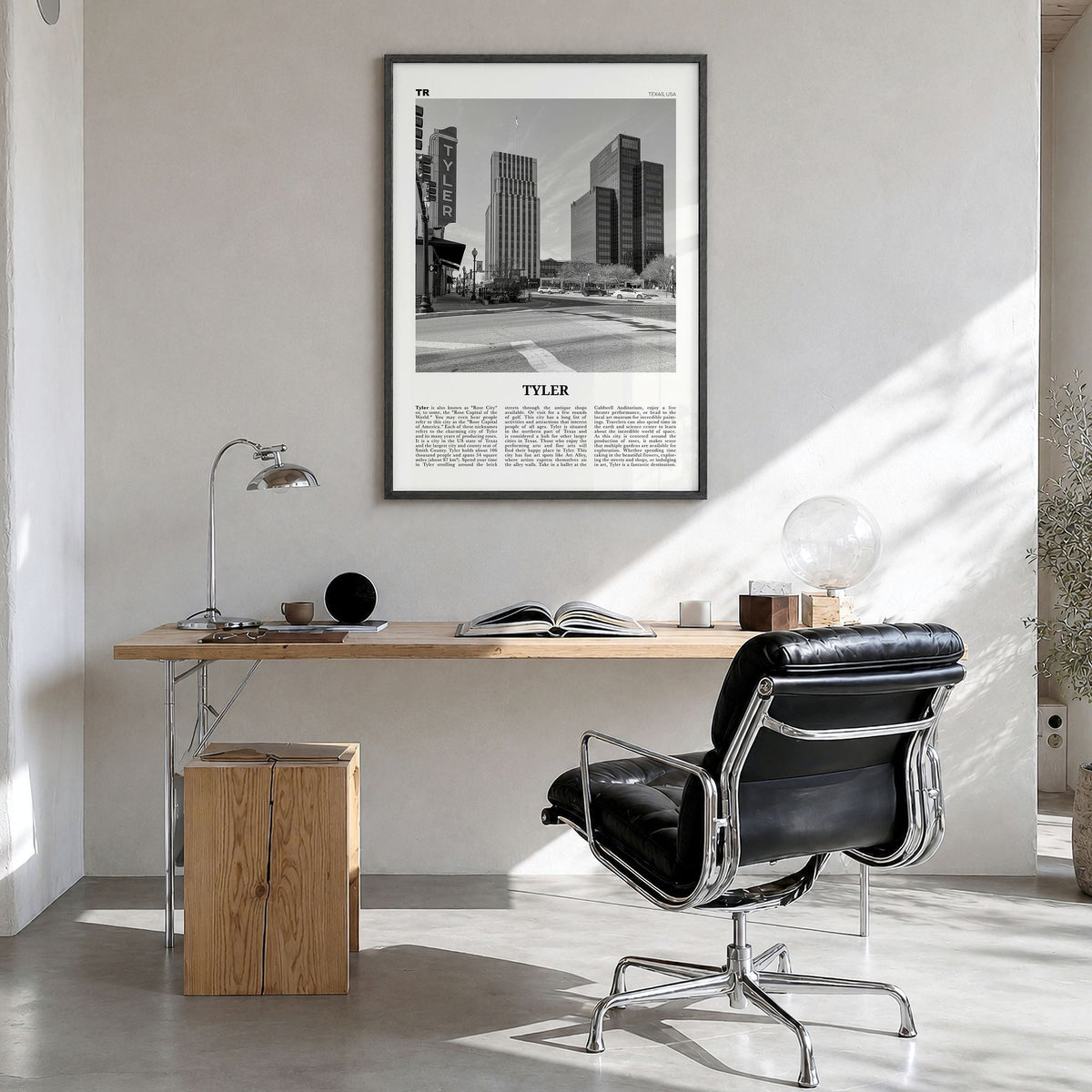 Tyler Newspaper Poster in a black wood frame, hanging in a bright home office