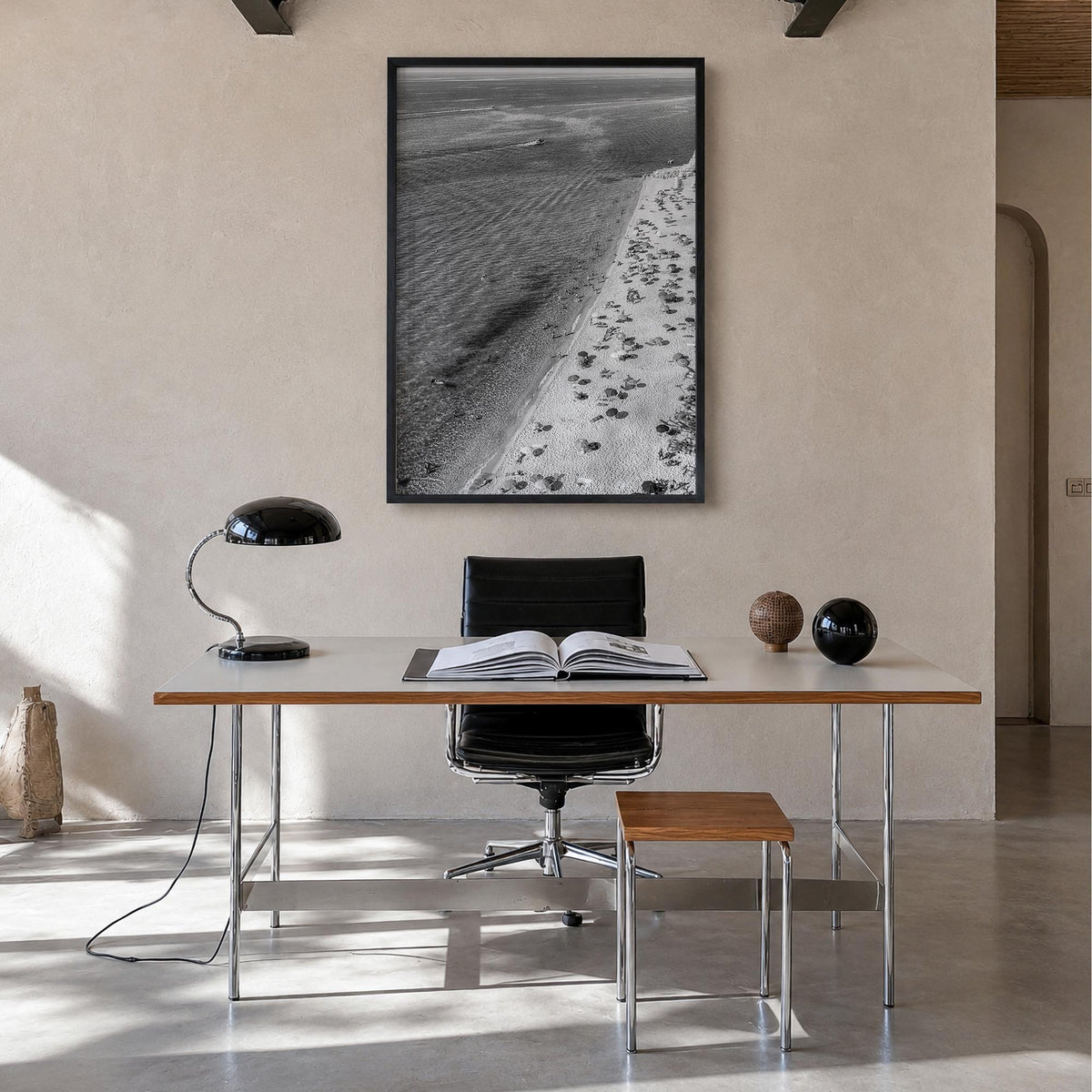 Tyrrhenian Sea no. 1 black & white photo poster of Italy – vertical wall art in black wood frame, hanging on wall