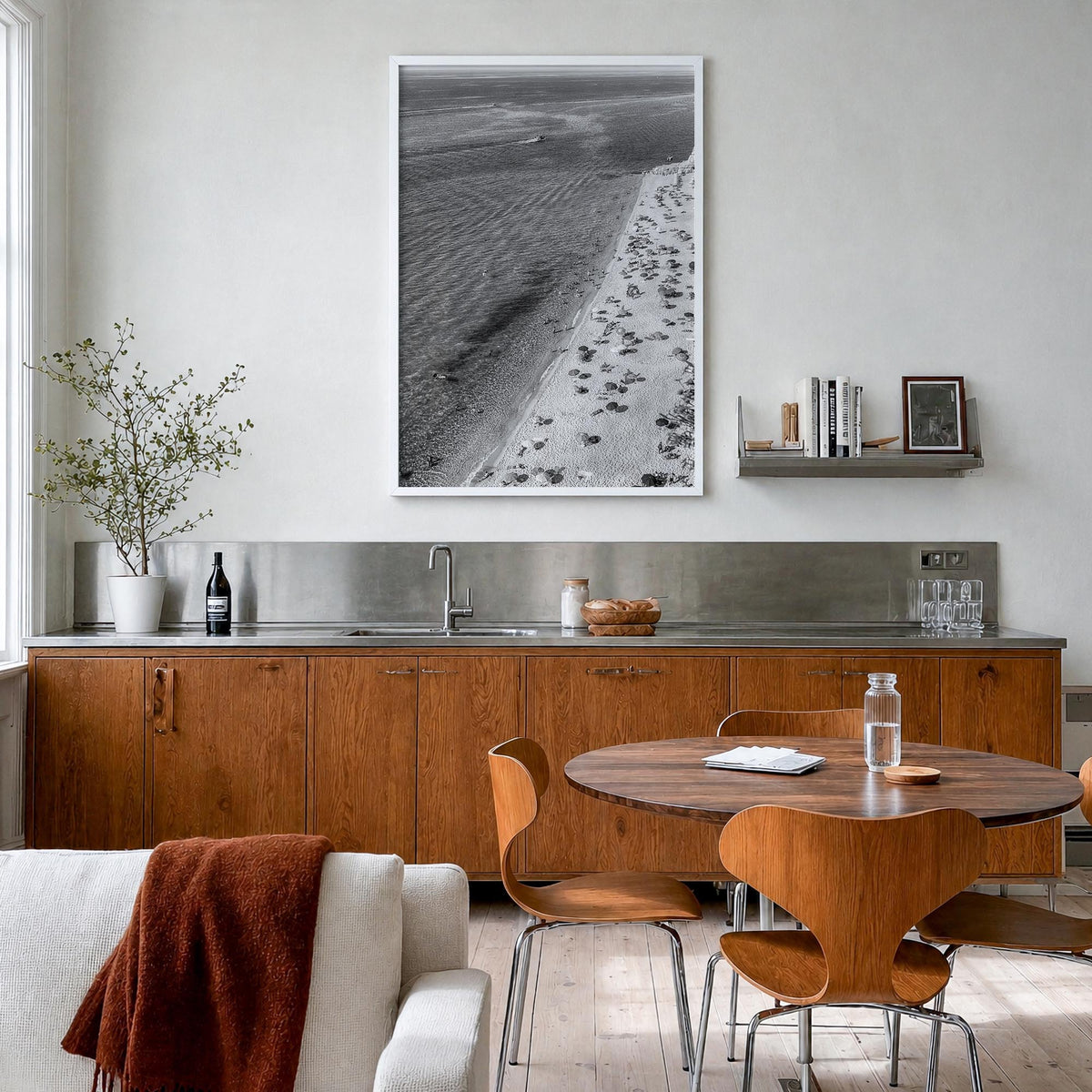 Tyrrhenian Sea no. 1 black & white photo poster of Italy – vertical wall art in white wood frame, hanging on wall