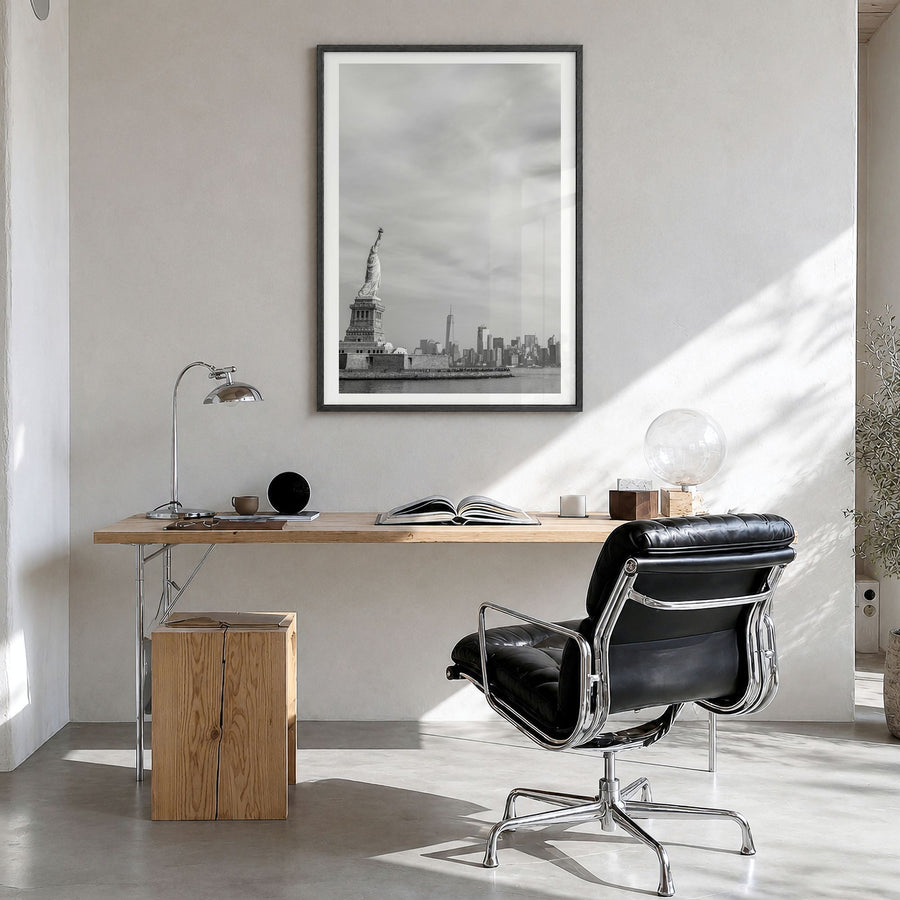 United States of America Photo Poster in a black wood frame, hanging in a bright home office, white border