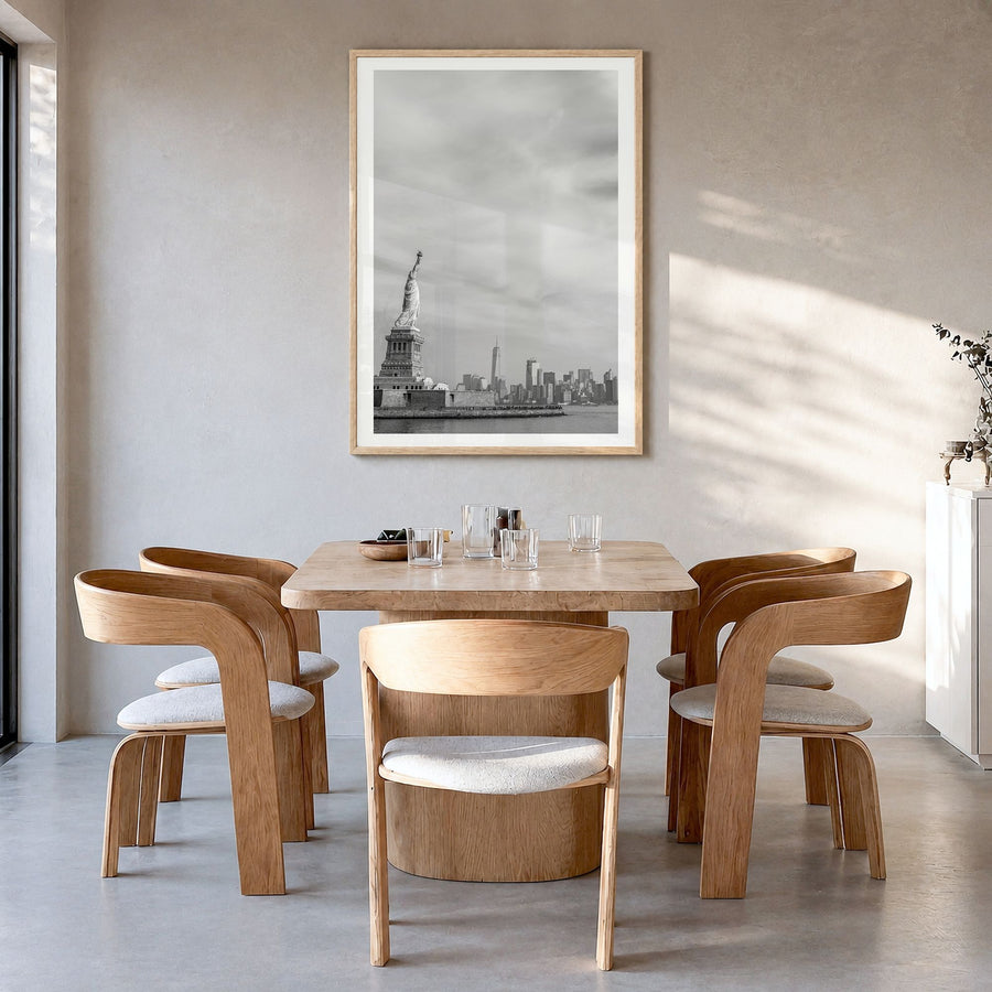 United States of America Photo Poster in a natural wood frame, hanging in a dining room, white border
