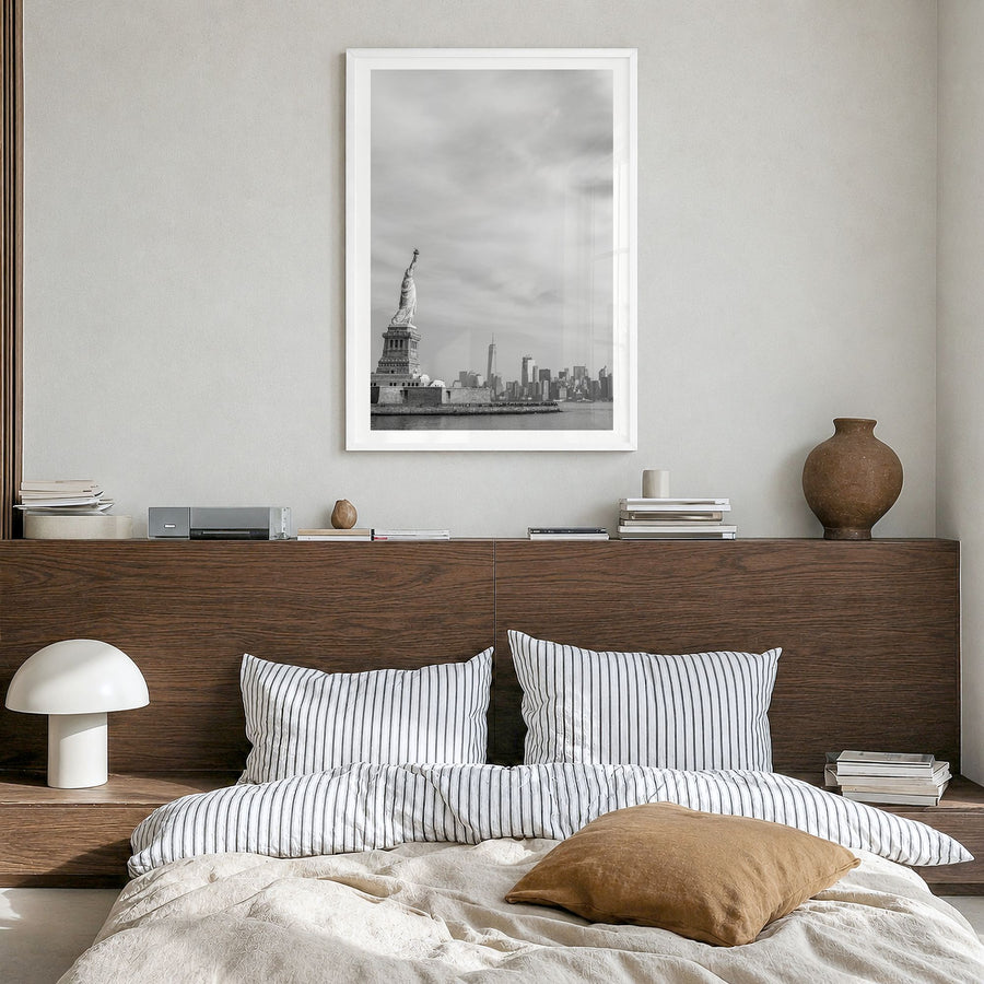 United States of America Photo Poster in a white wood frame, hanging in a bedroom, white border