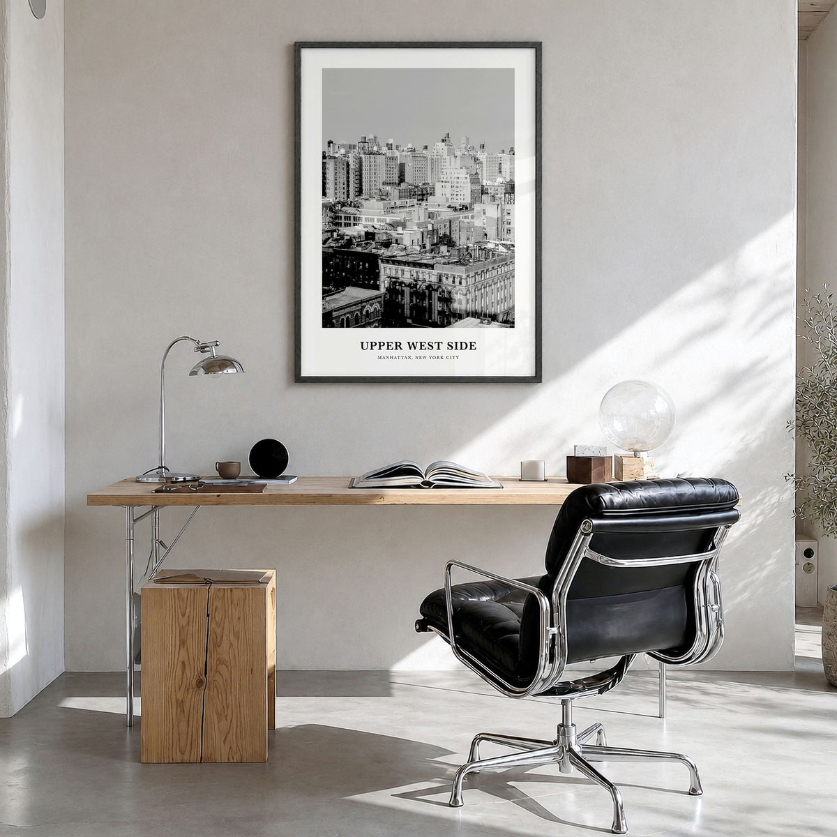 Upper West Side Classic Poster in a black wood frame, hanging in a bright home office