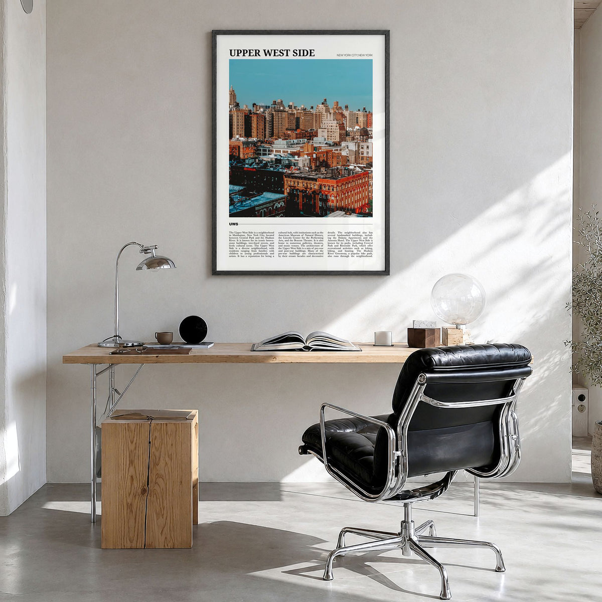 Upper West Side Travel Poster in a black wood frame, hanging in a bright home office