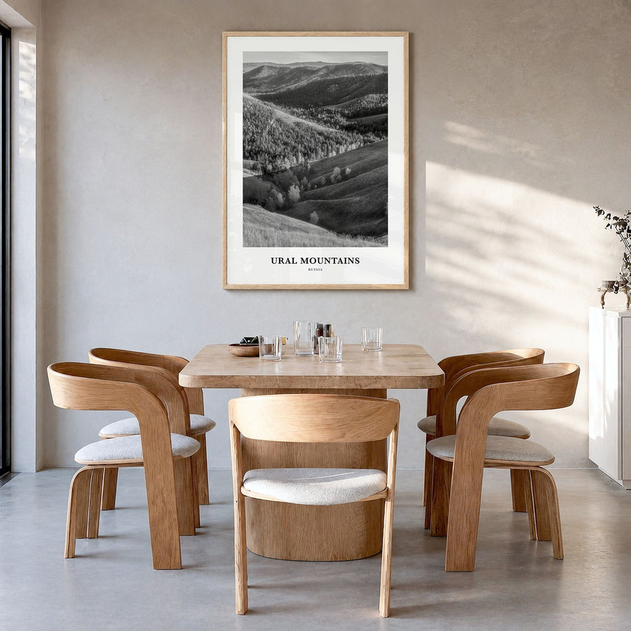 Ural Mountains Classic Poster in a natural wood frame, hanging in a dining room