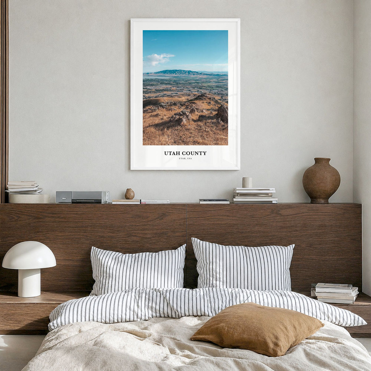 Utah County Classic Poster in a white wood frame, hanging in a bedroom
