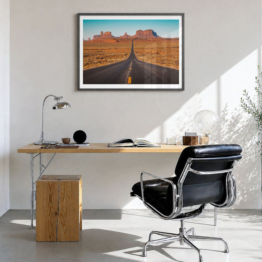 Utah Photo Poster in a black wood frame, hanging in a bright home office, white border
