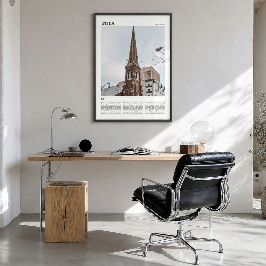 Utica Travel Poster in a black wood frame, hanging in a bright home office