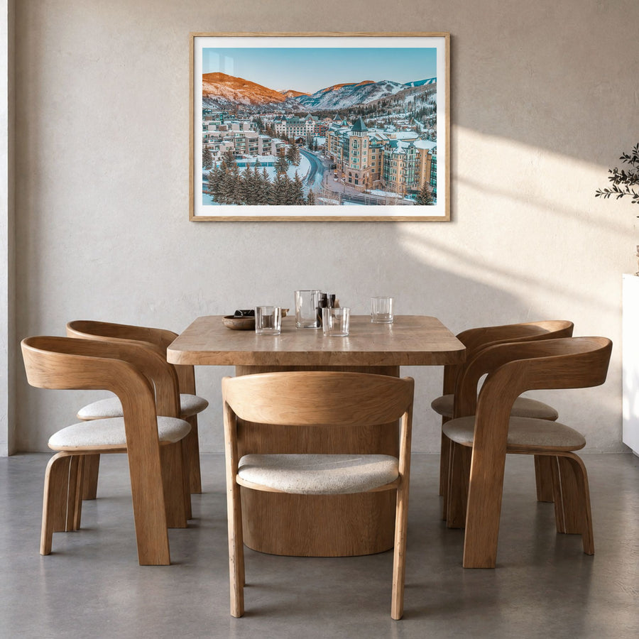 Vail Photo Poster in a natural wood frame, hanging in a dining room, white border