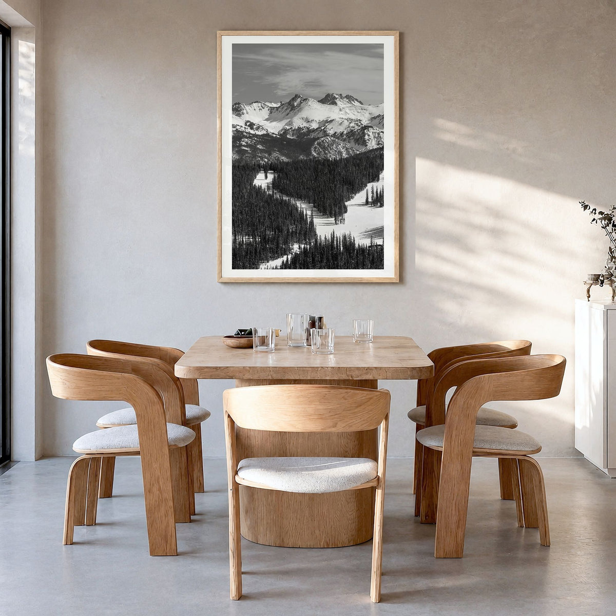 Vail Photo Poster in a natural wood frame, hanging in a dining room, white border