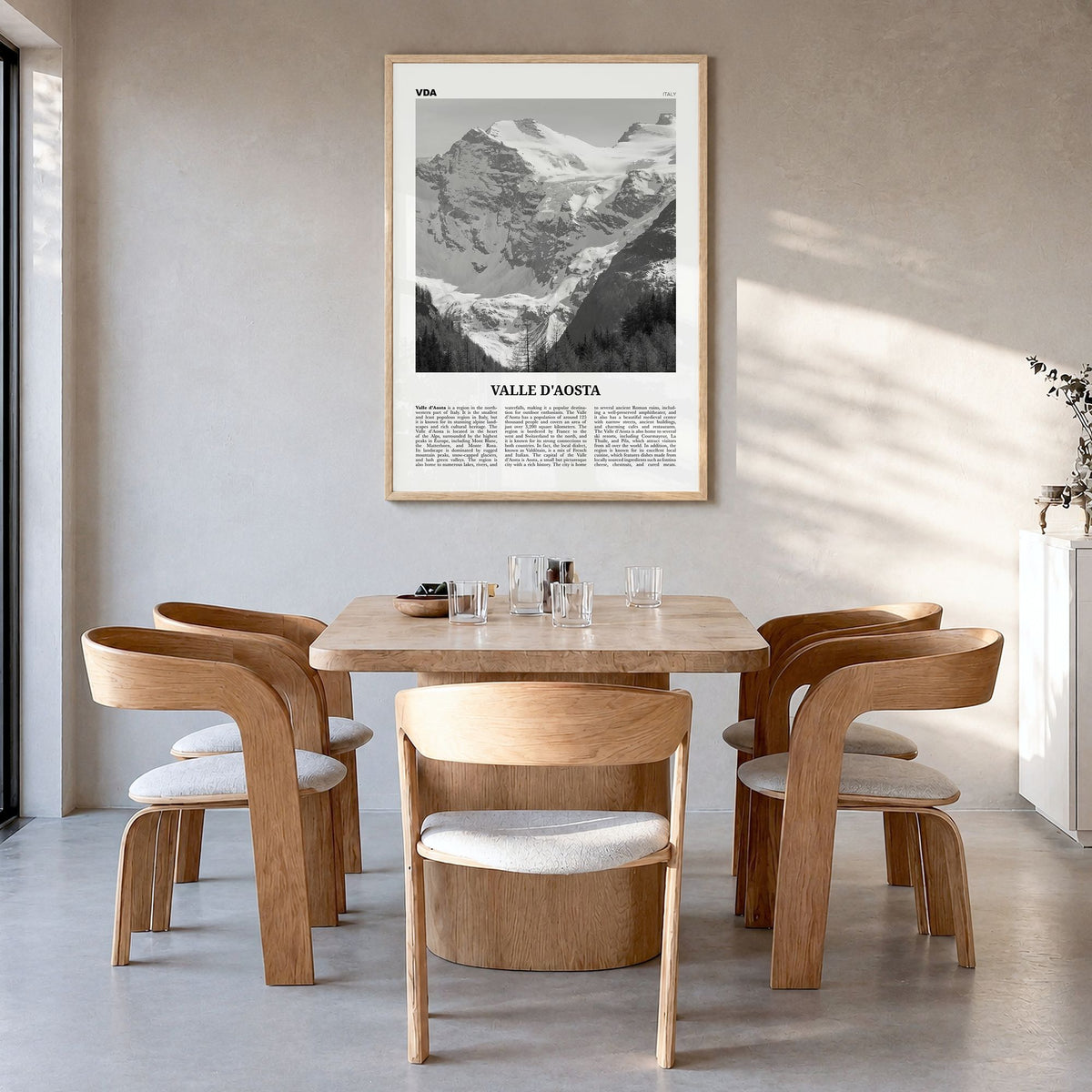 Valle d'Aosta Newspaper Poster in a natural wood frame, hanging in a dining room