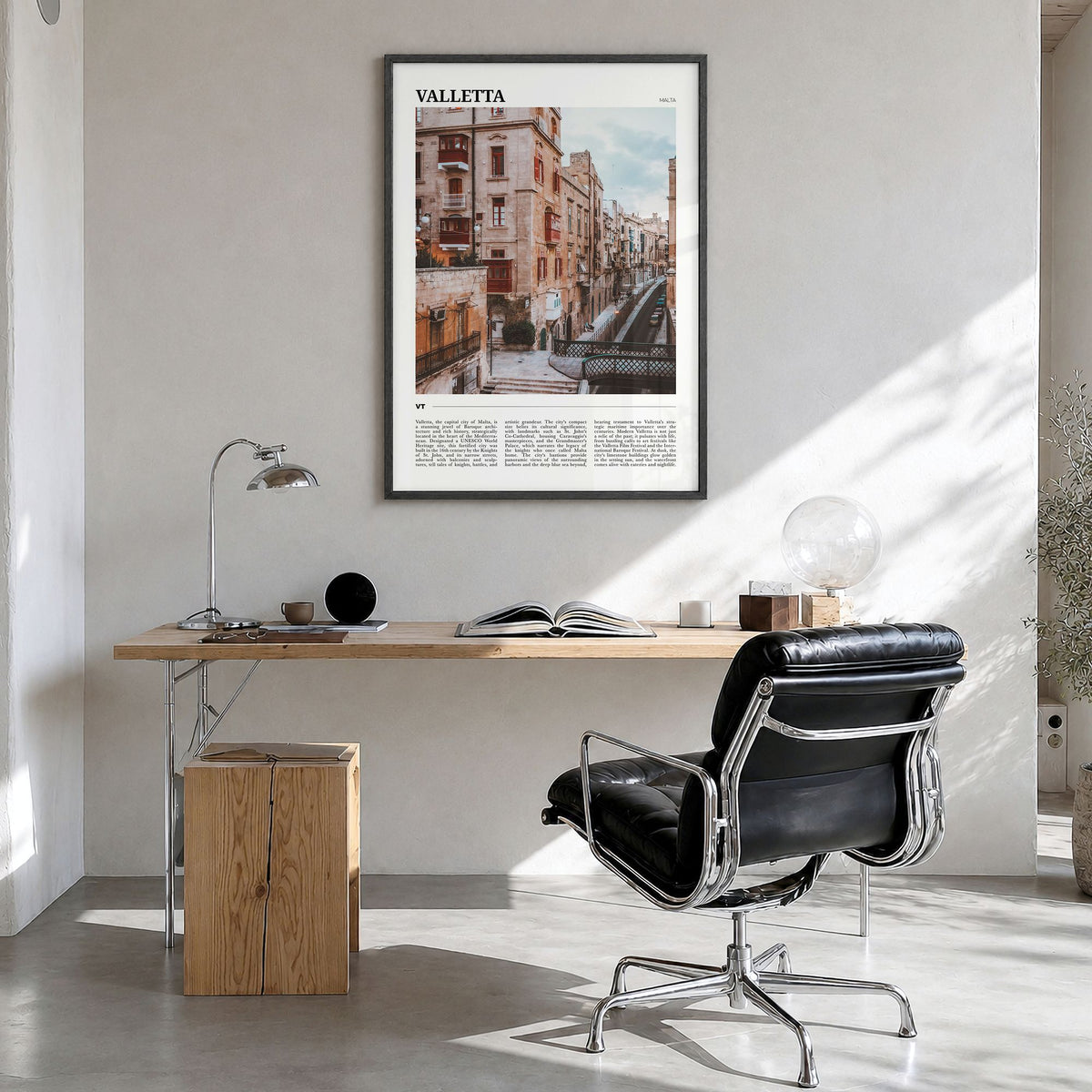 Valletta Travel Poster in a black wood frame, hanging in a bright home office
