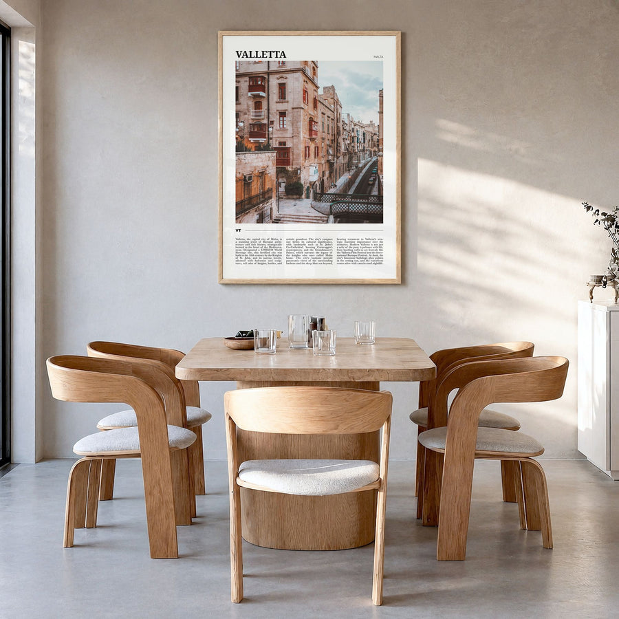 Valletta Travel Poster in a natural wood frame, hanging in a dining room