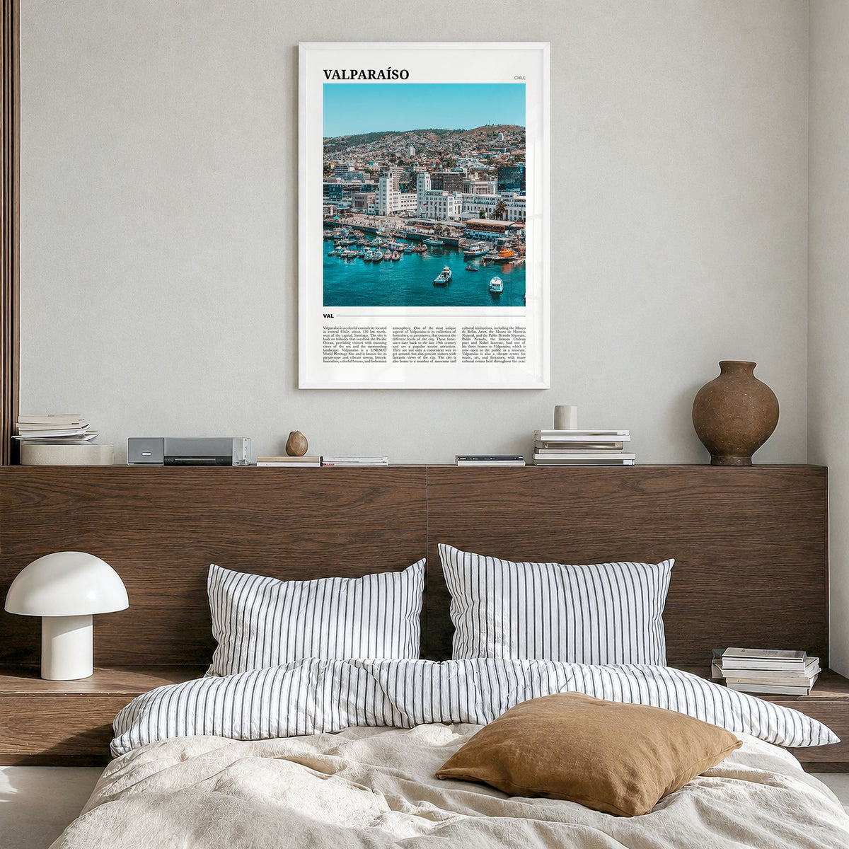 Valparaíso Travel Poster in a white wood frame, hanging in a bedroom