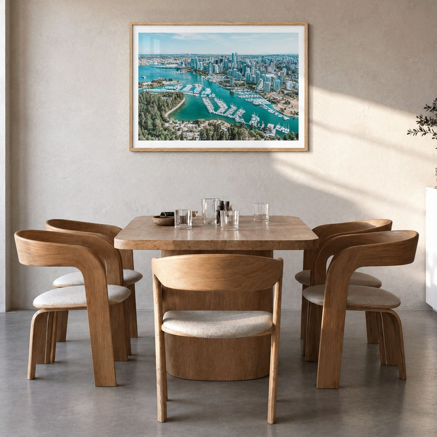 Vancouver, Canada Photo Poster in a natural wood frame, hanging in a dining room, white border
