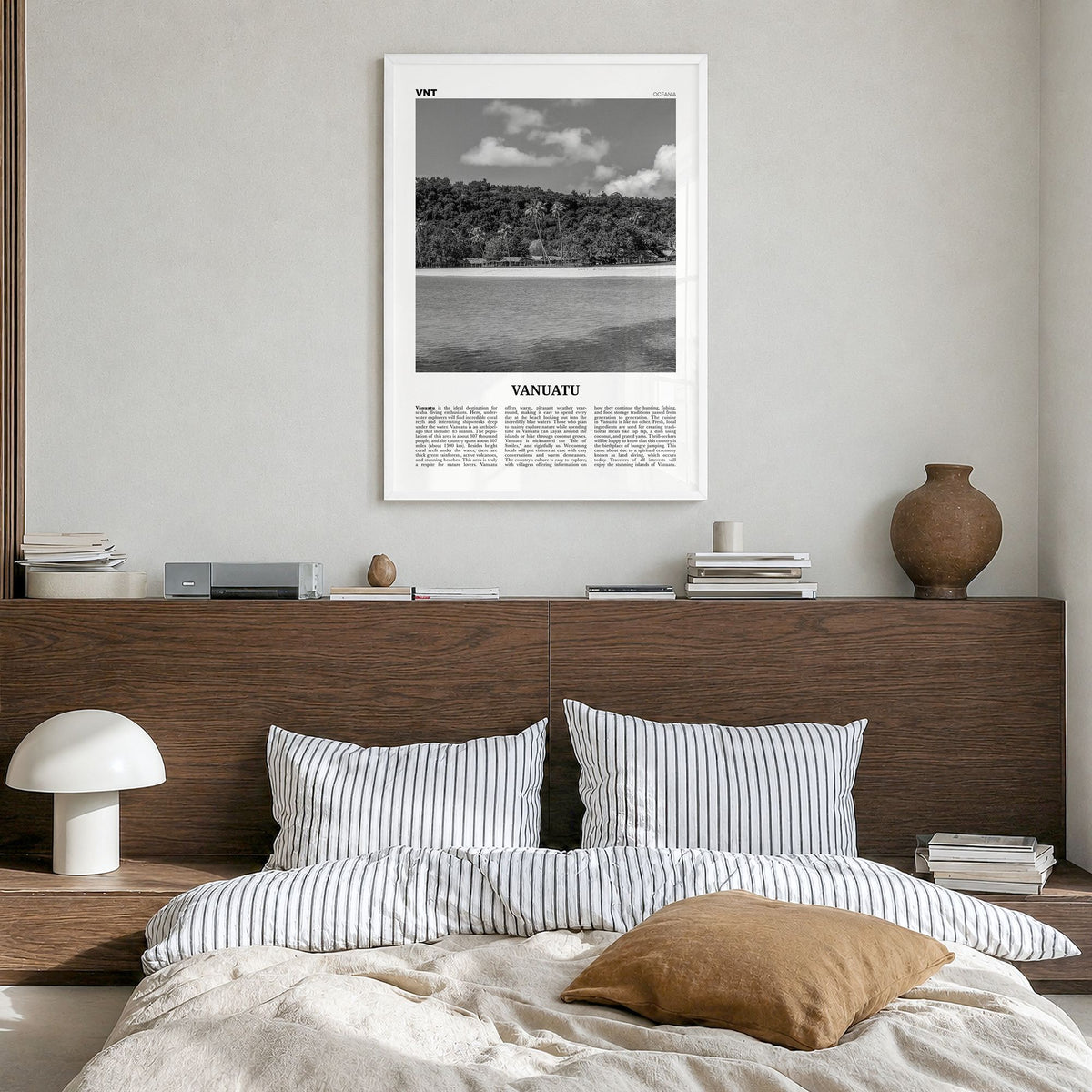 Vanuatu Newspaper Poster in a white wood frame, hanging in a bedroom