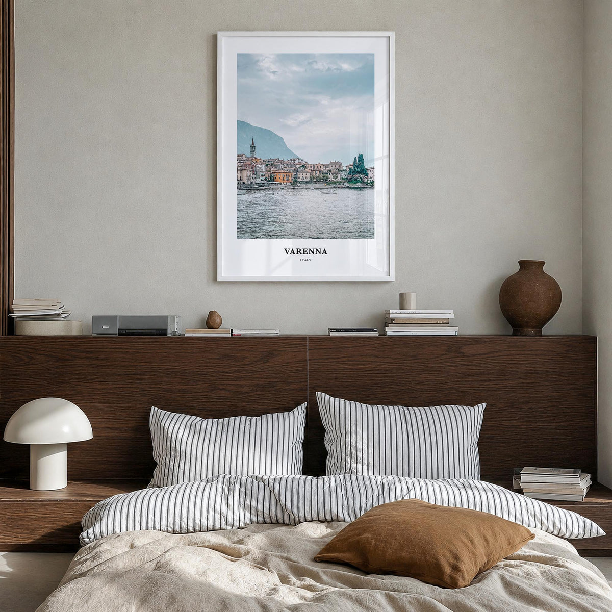 Varenna colorful classic poster of Italy – vertical wall art in white wood frame, hanging on wall