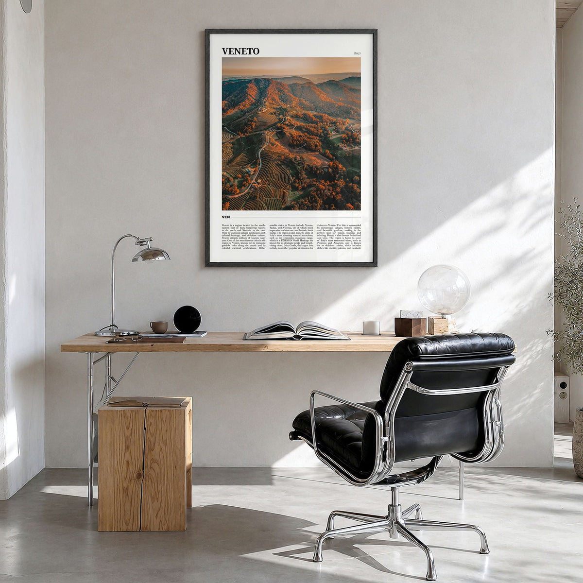 Veneto Travel Poster in a black wood frame, hanging in a bright home office