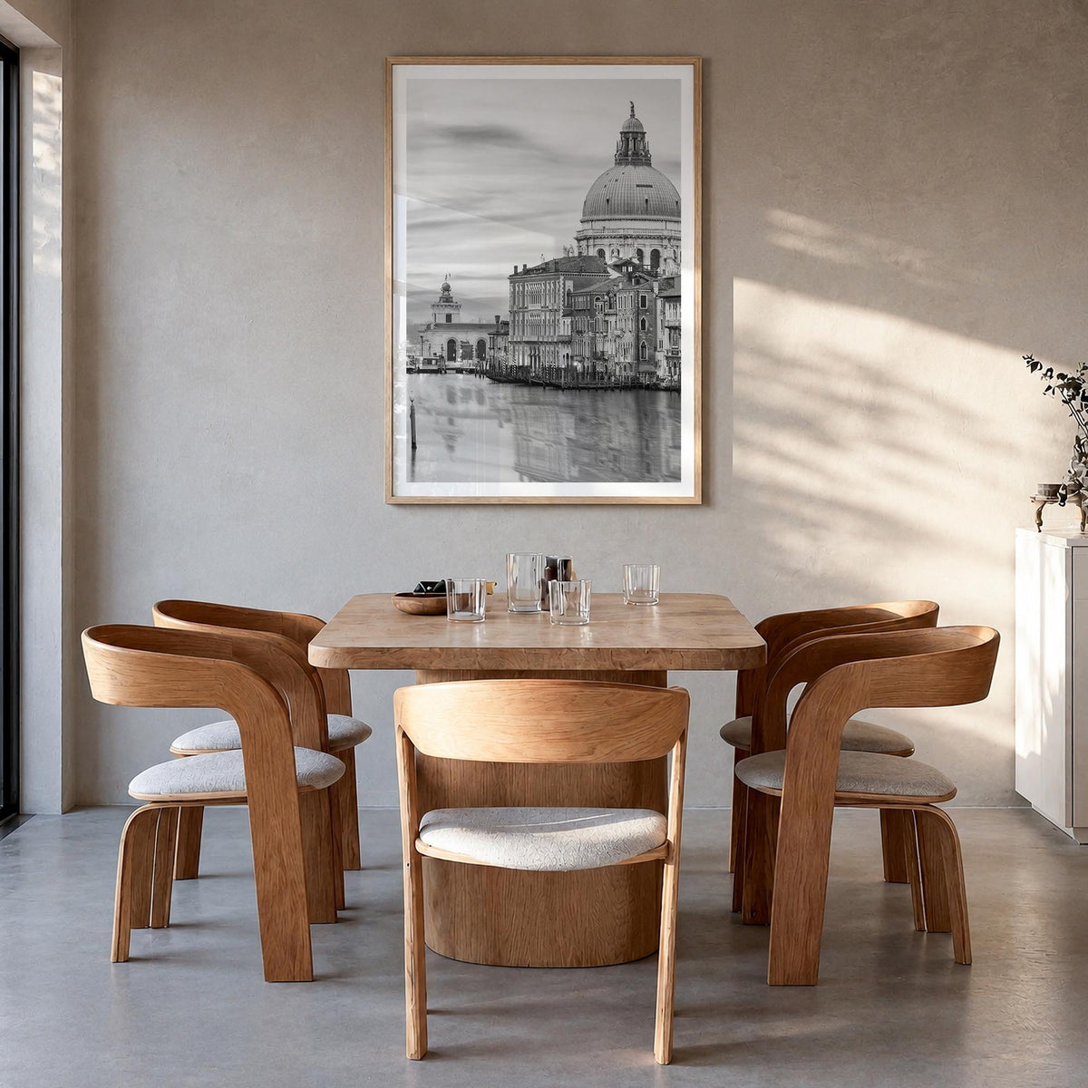 Venice no. 1 black & white photo poster of Italy – vertical wall art in natural wood frame with white border, hanging on wall