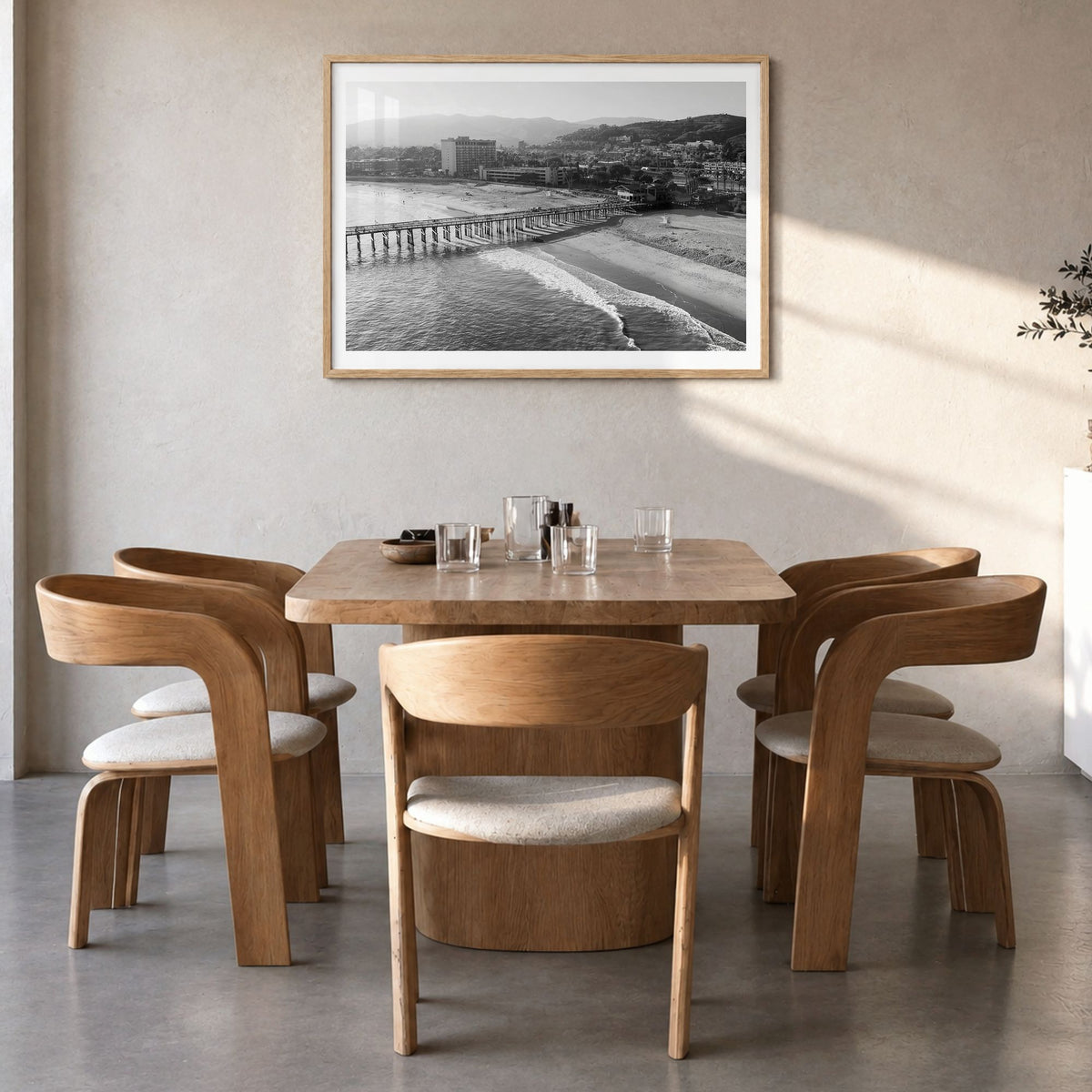 Ventura Photo No 2 Poster in a natural wood frame, hanging in a dining room, white border