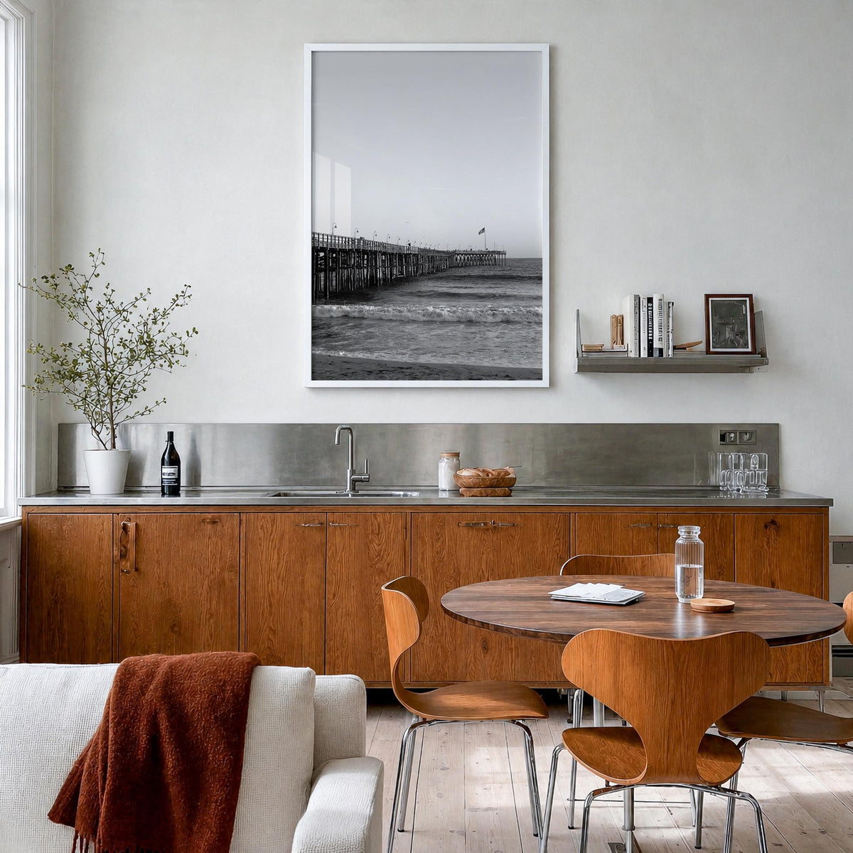 Ventura no. 1 black & white photo poster of California, USA – vertical wall art in white wood frame, hanging on wall