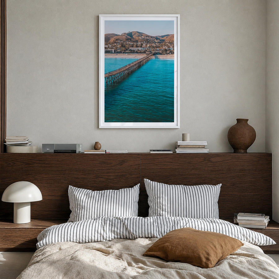 Ventura no. 1 colorful photo poster of California, USA – vertical wall art in white wood frame with white border, hanging on 