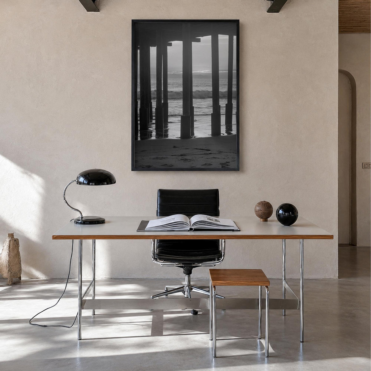 Ventura no. 2 black & white photo poster of California, USA – vertical wall art in black wood frame, hanging on wall