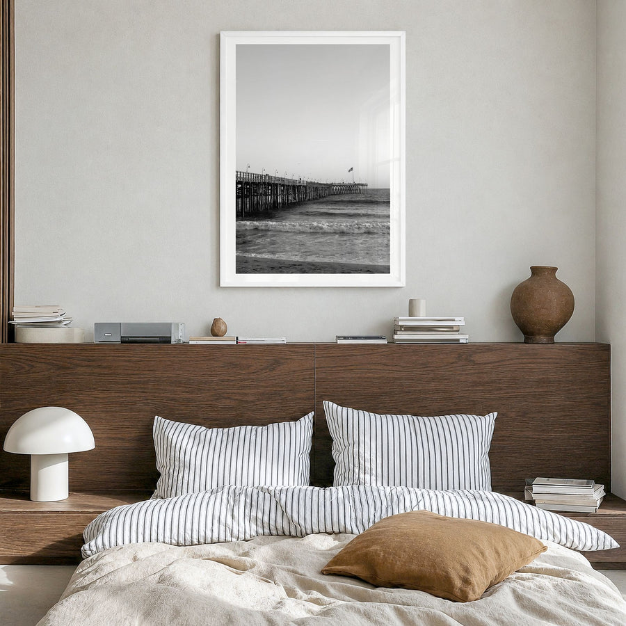 Ventura Photo No 1 Poster in a white wood frame, hanging in a bedroom, white border