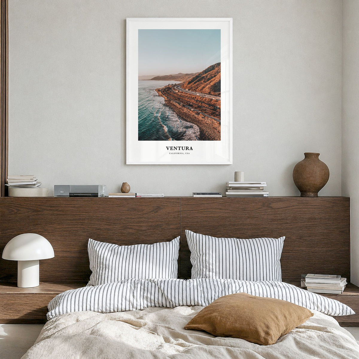 Ventura Classic No 1 Poster in a white wood frame, hanging in a bedroom